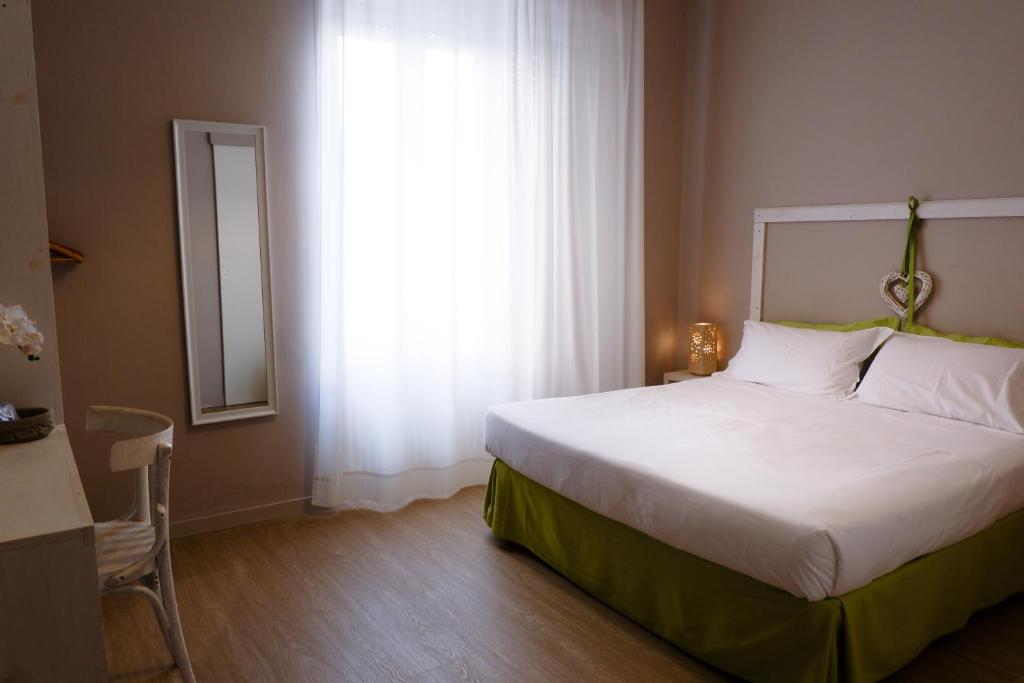 Postel nebo postele na pokoji v ubytování Myricae
