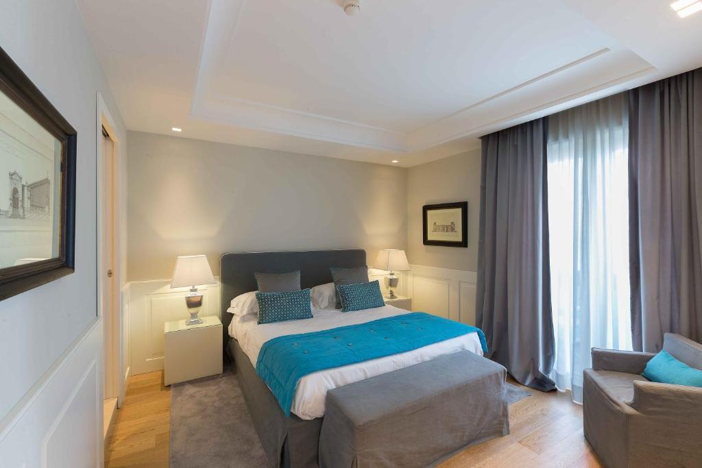 Postel nebo postele na pokoji v ubytování Hotel Lungomare