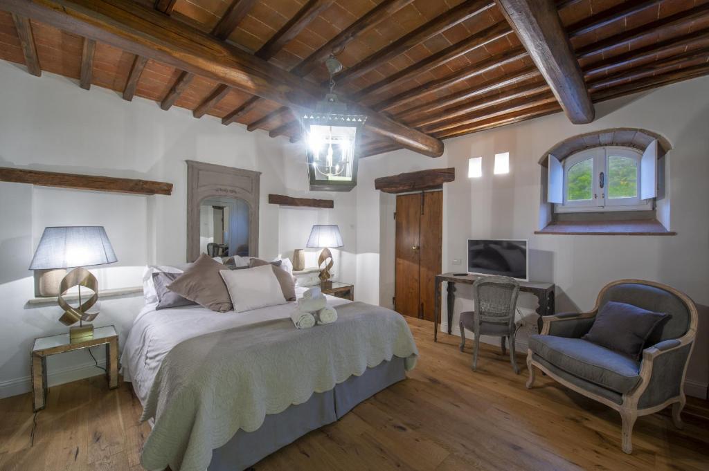 Posteľ alebo postele v izbe v ubytovaní Villa il Vigneto - Homelike Villas