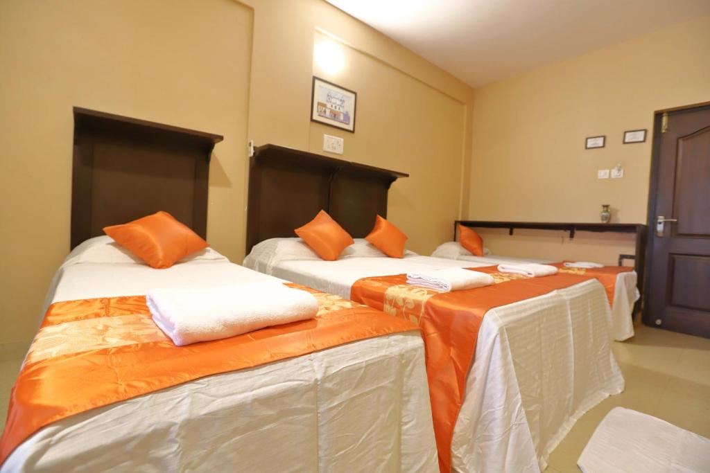 Postel nebo postele na pokoji v ubytování Dimar Beach Hotel