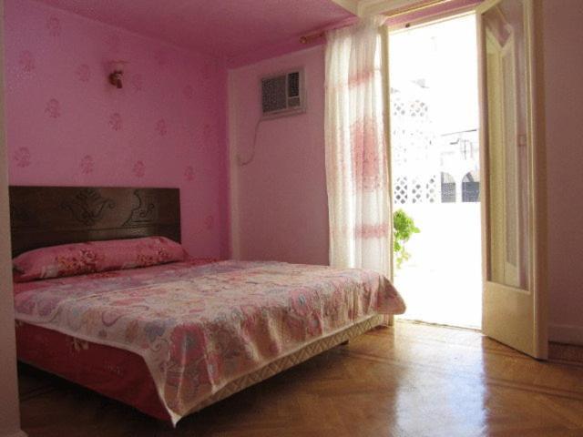 Postel nebo postele na pokoji v ubytování Cairo Moon Hostel
