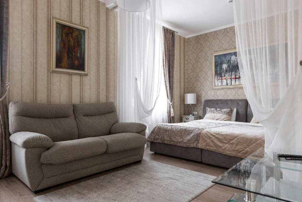 Ένα ή περισσότερα κρεβάτια σε δωμάτιο στο Hotel "Mandarin Clubhouse"