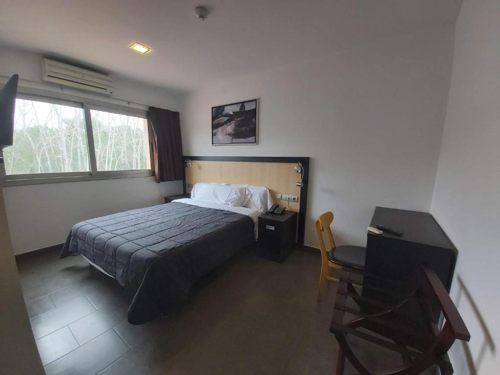 Postel nebo postele na pokoji v ubytování Hotel 170