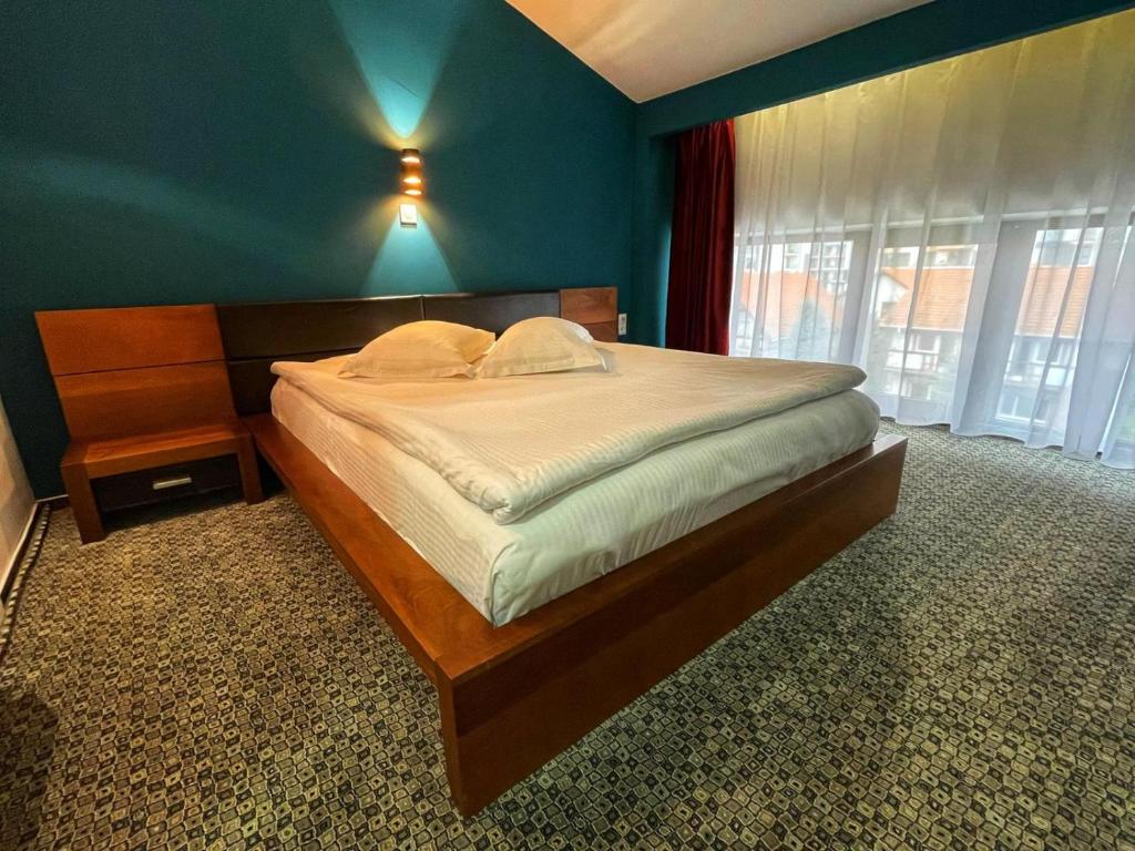 Postel nebo postele na pokoji v ubytování Hotel Best