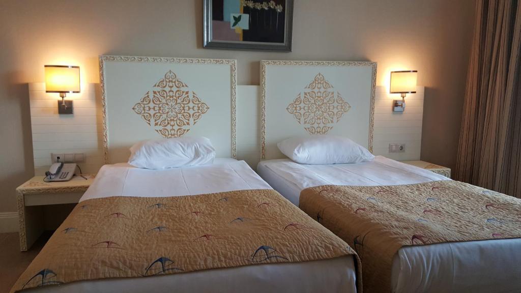 Postel nebo postele na pokoji v ubytování Crystal Admiral Resort Suites & Spa - Ultimate All Inclusive