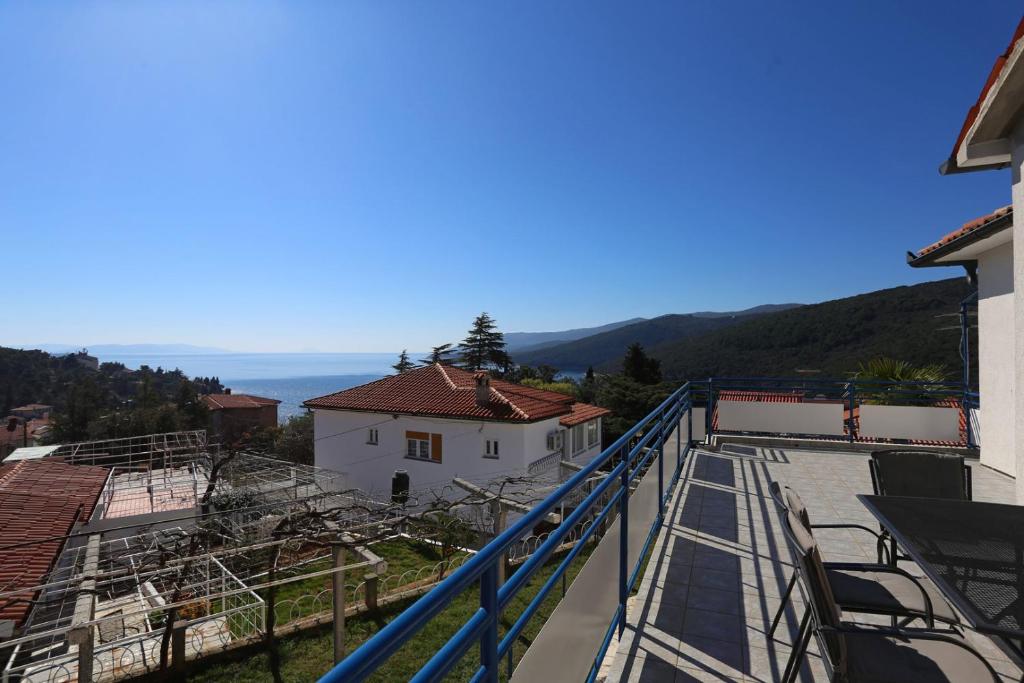 a view from the balcony of a house at Apartments Marija 1000 in Rabac