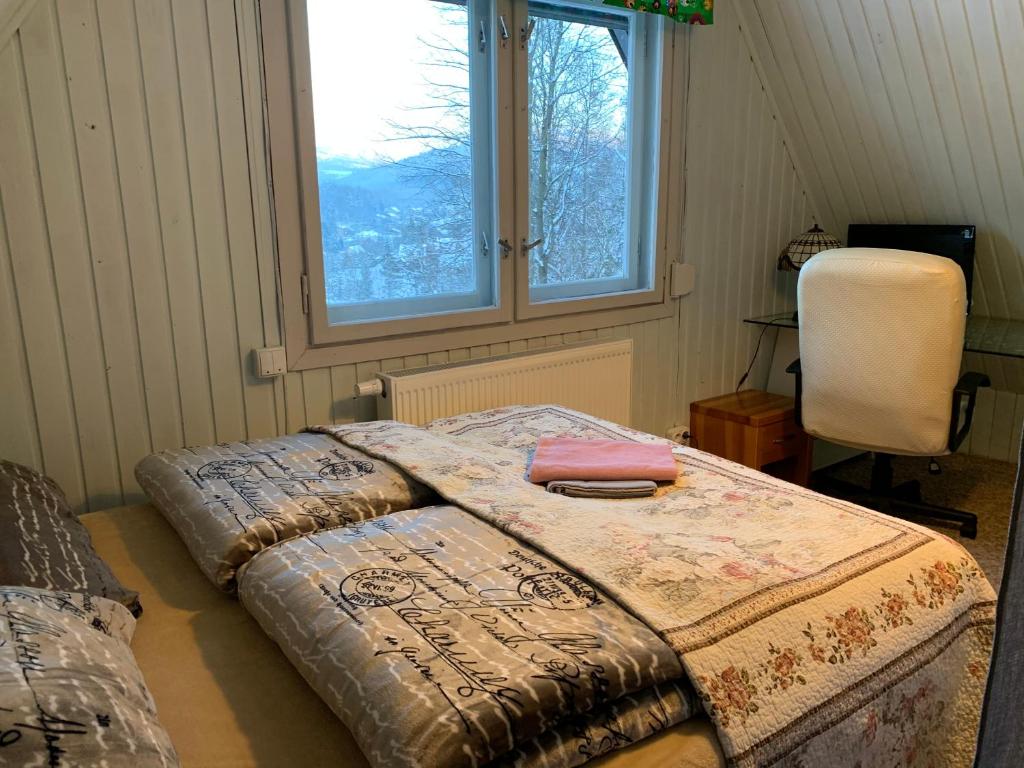 Postel nebo postele na pokoji v ubytování Sosnowy Zakatek