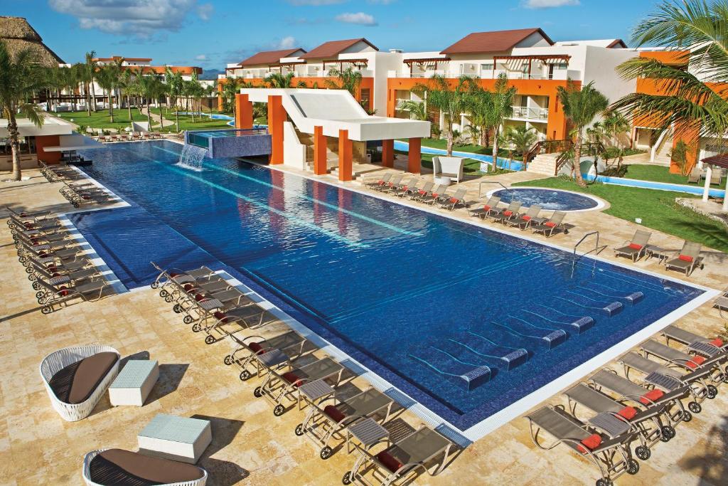 an overhead view of a swimming pool at a resort at Breathless Punta Cana Resort & Spa - Adults Only in Punta Cana