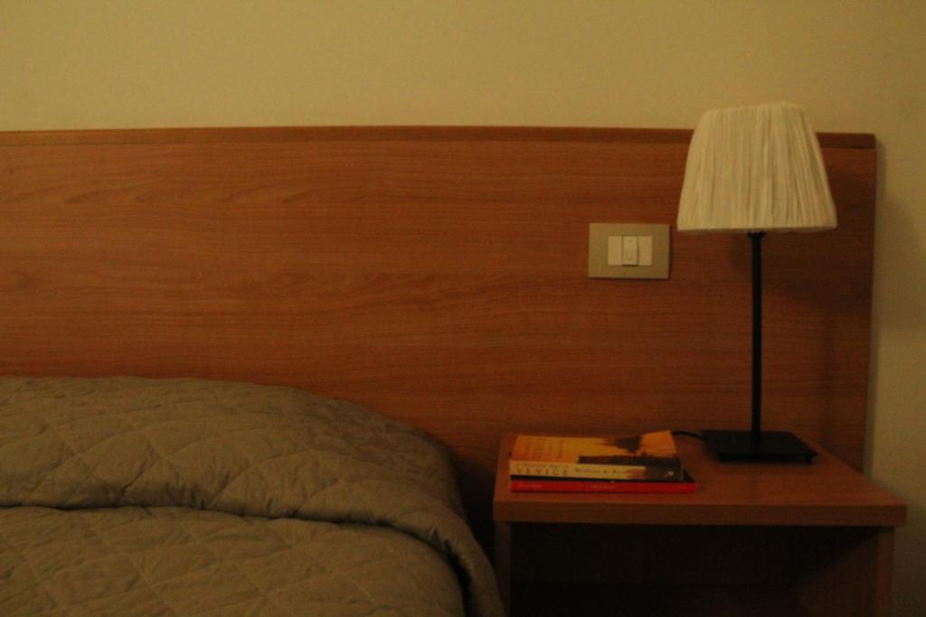 Postel nebo postele na pokoji v ubytování Hotel Casa a Colori Venezia