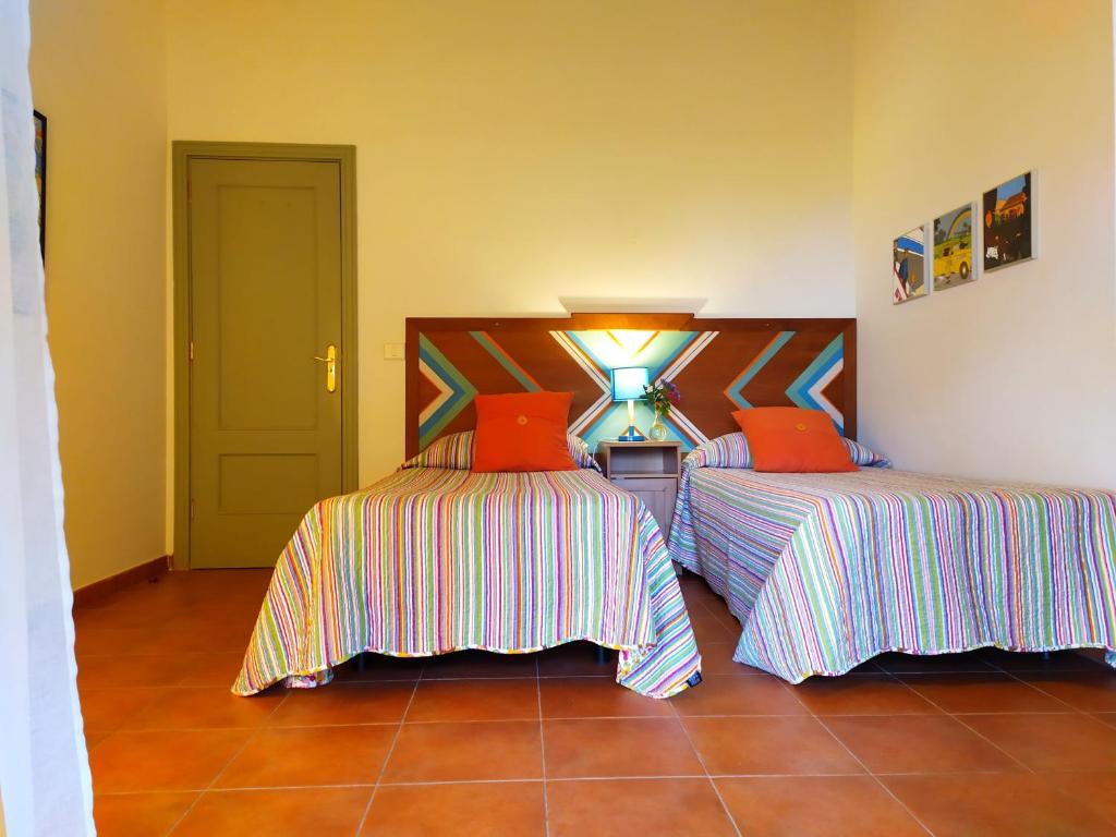 Posteľ alebo postele v izbe v ubytovaní Gomera Garden. Vista Mar Altozano