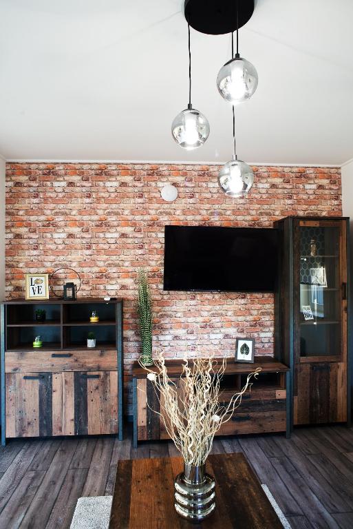 TV a/nebo společenská místnost v ubytování A-765 Apartman