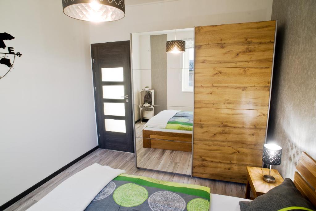 Postel nebo postele na pokoji v ubytování A-765 Apartman