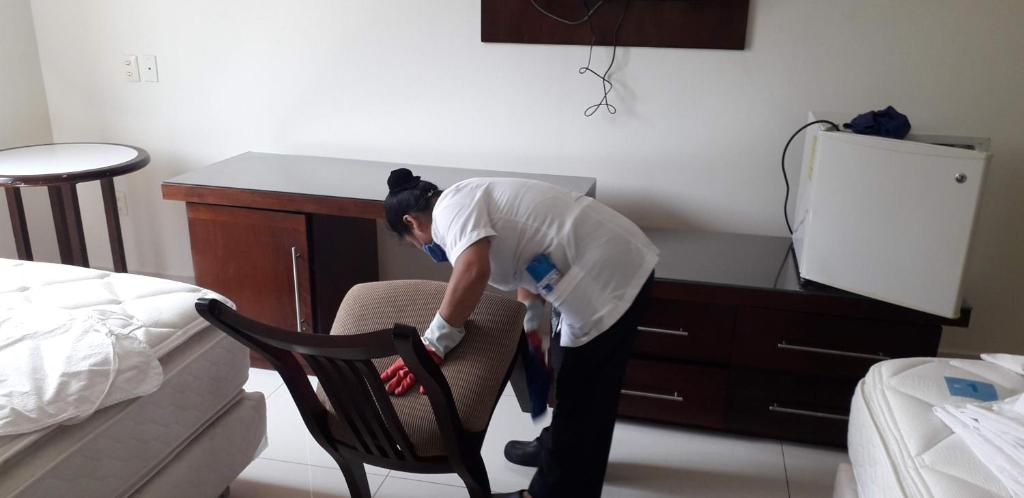 Postel nebo postele na pokoji v ubytování Hotel Marel