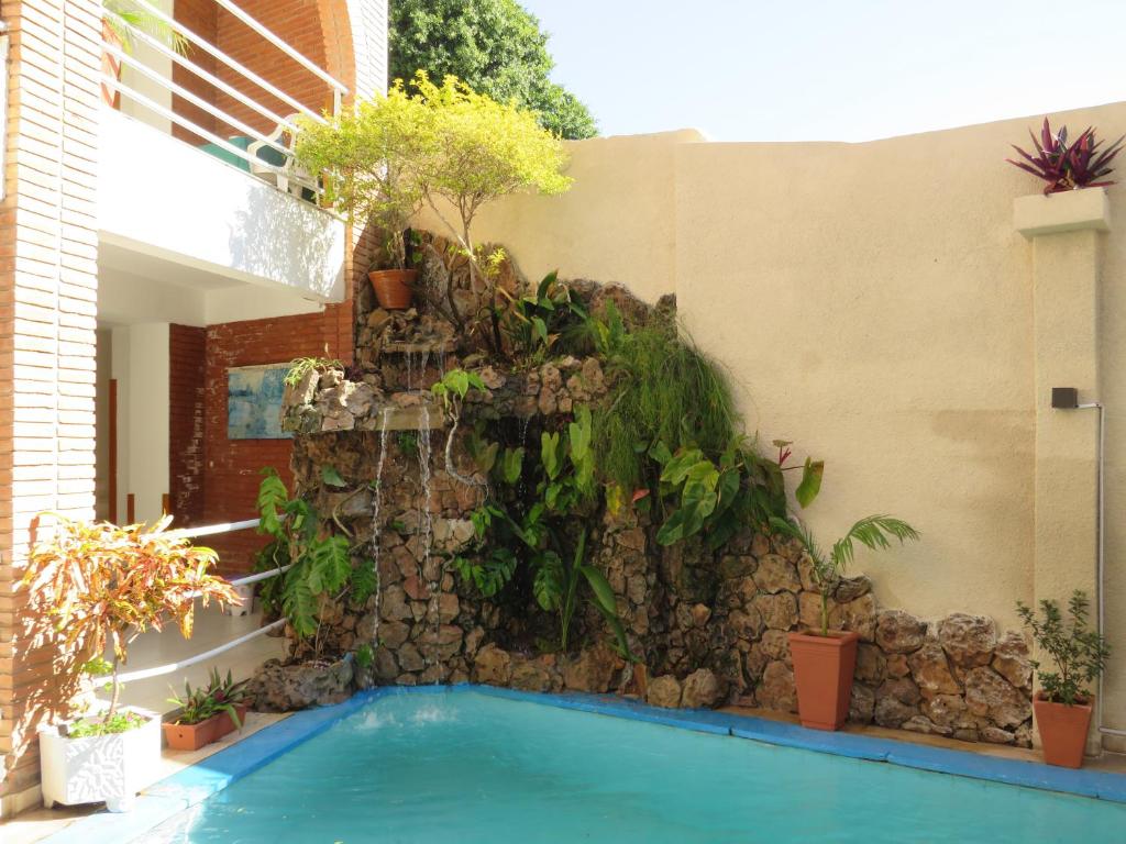 Bazén v ubytování Hotel Palmas del Sol nebo v jeho okolí