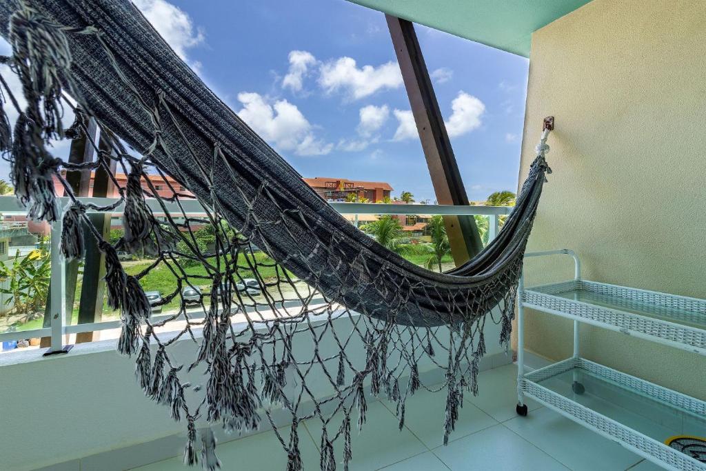  Apto no Villas do Atlântico com vista piscina próximo ao mar por Carpediem