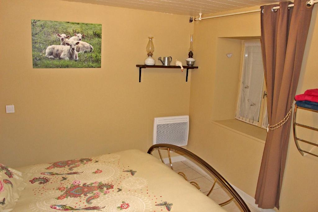 Postel nebo postele na pokoji v ubytování Le Pré de Luceau