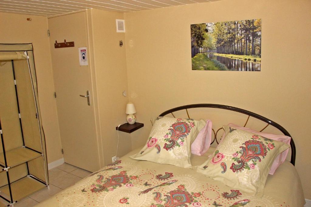 Postel nebo postele na pokoji v ubytování Le Pré de Luceau