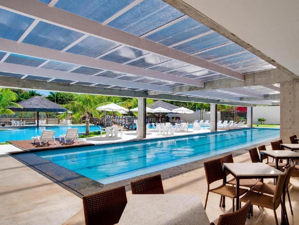 A piscina localizada em Apartamento Le Jardin ou nos arredores