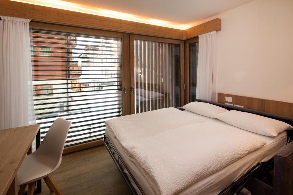 Postel nebo postele na pokoji v ubytování Moon Eco B&B