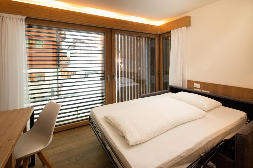 Postel nebo postele na pokoji v ubytování Moon Eco B&B