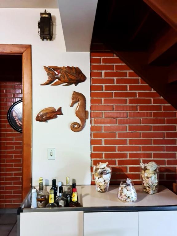  Casa perto da areia em Guaeca com WiFi e churrasq