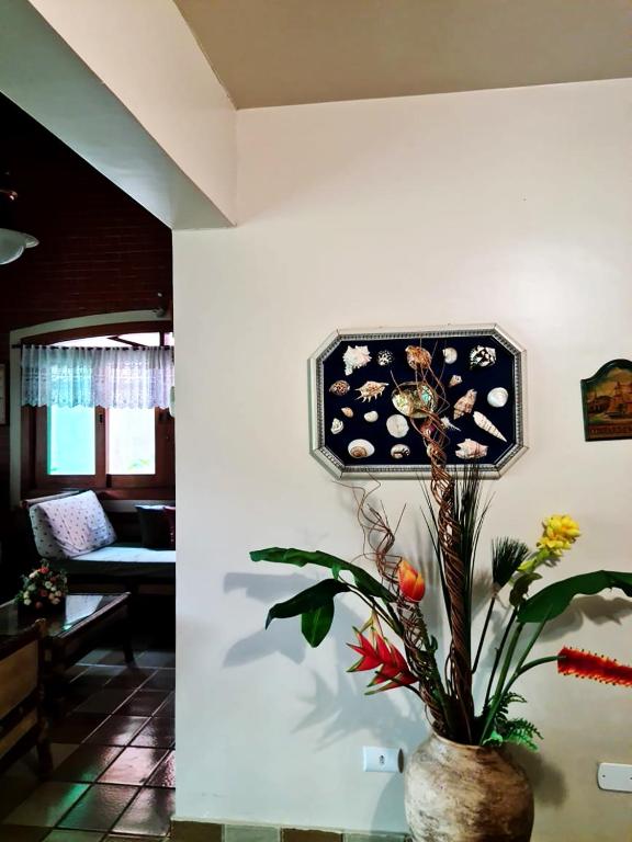  Casa perto da areia em Guaeca com WiFi e churrasq