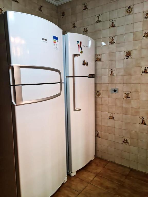  Casa perto da areia em Guaeca com WiFi e churrasq