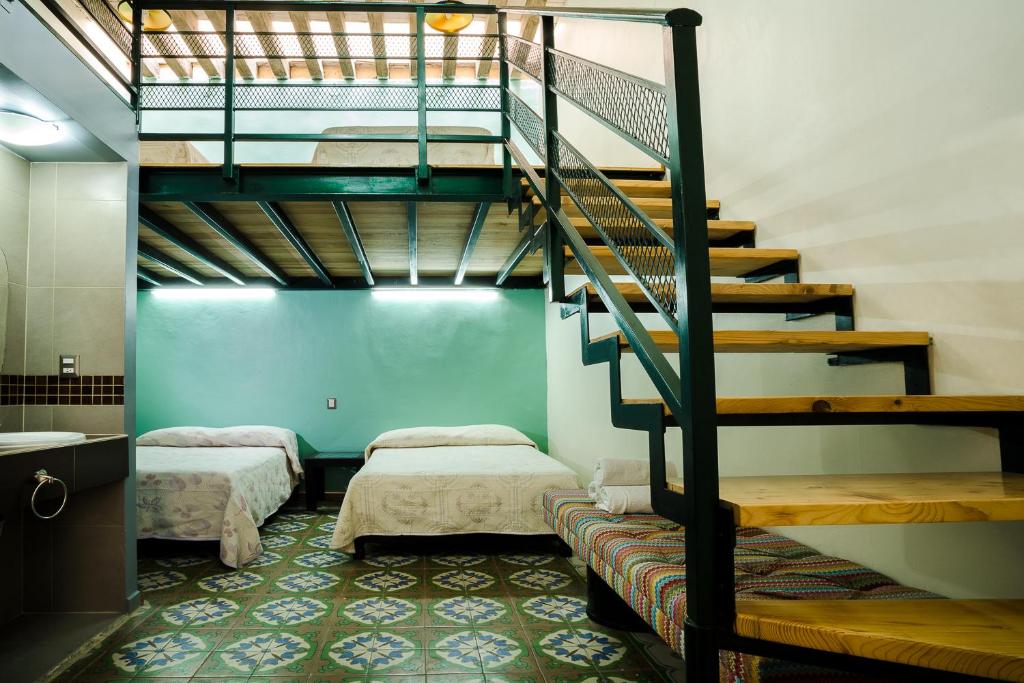 Poschodová posteľ alebo postele v izbe v ubytovaní Hostal Santo Domingo