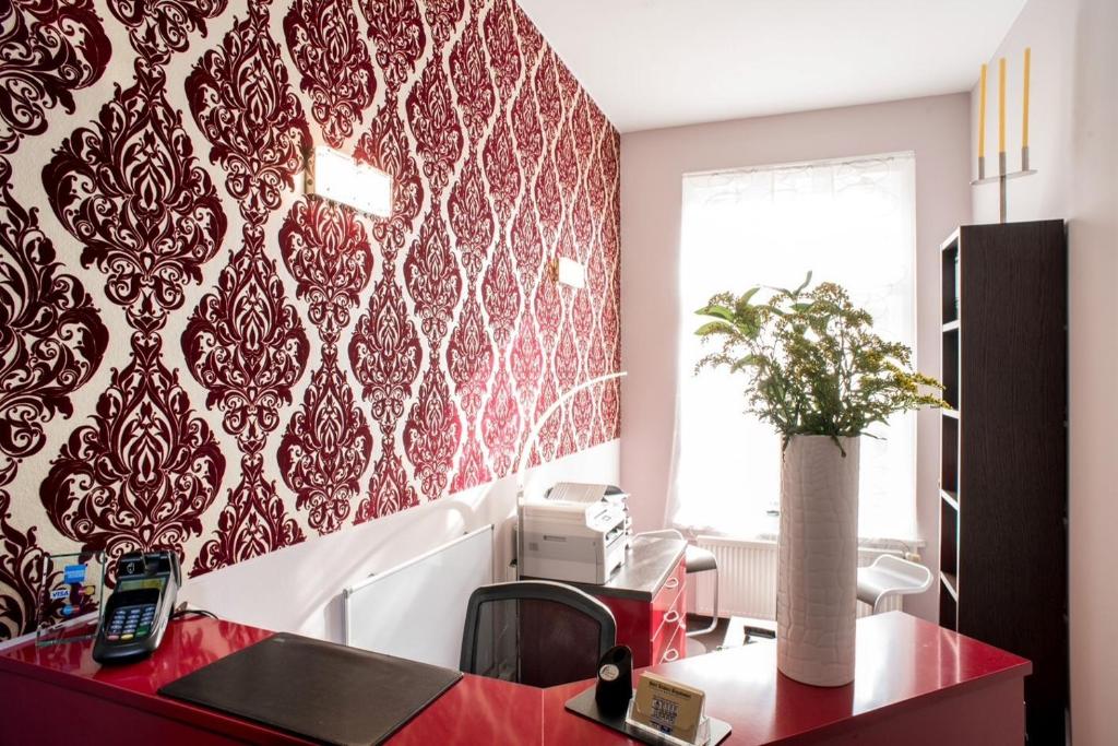 Postel nebo postele na pokoji v ubytování Hotel Residenz Begaswinkel