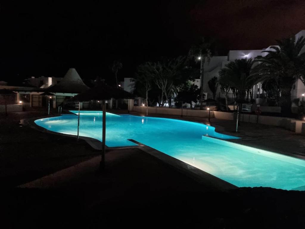 Bazén v ubytování Casa a primera linea de mar nebo v jeho okolí