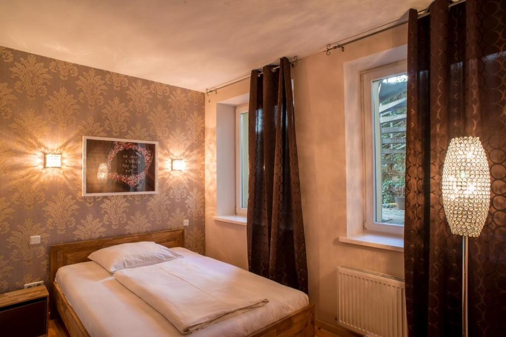 Postel nebo postele na pokoji v ubytování Hotel Residenz Begaswinkel