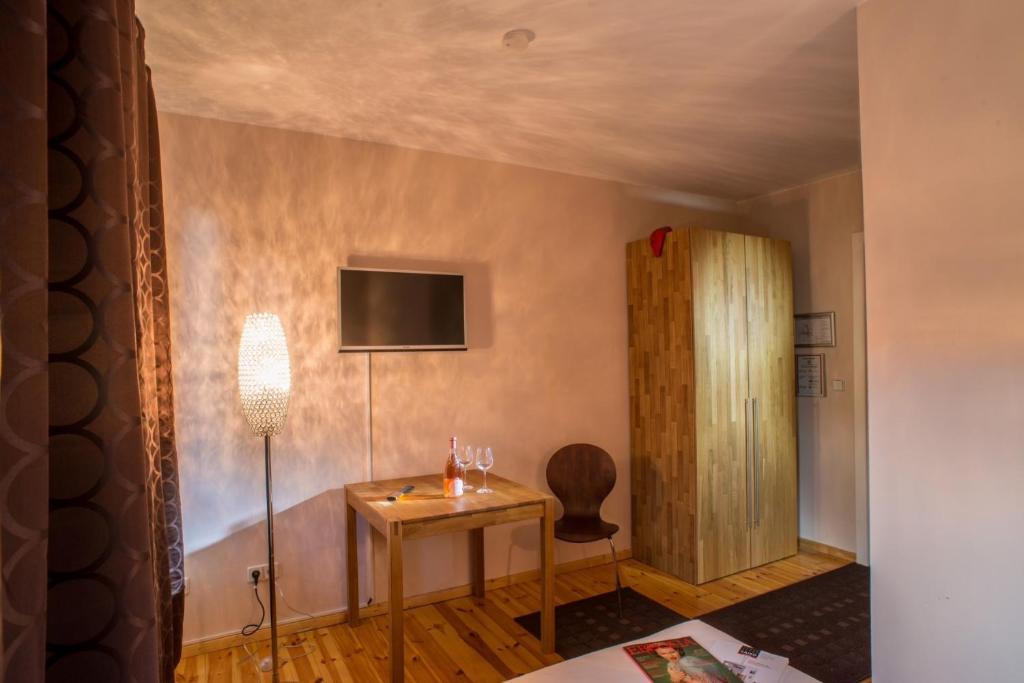 TV a/nebo společenská místnost v ubytování Hotel Residenz Begaswinkel