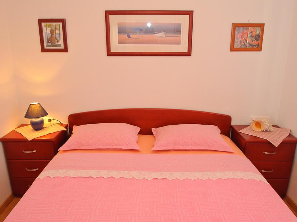 Voodi või voodid majutusasutuse Žigulin Apartment toas