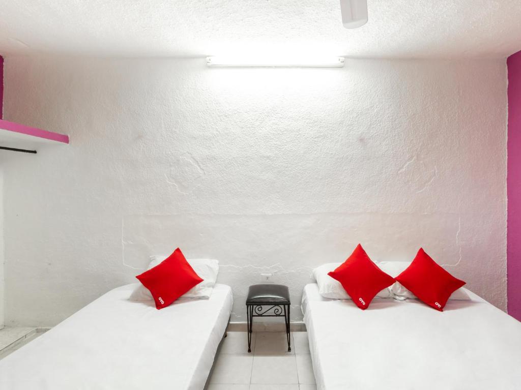 Postel nebo postele na pokoji v ubytování Hotel Aventura