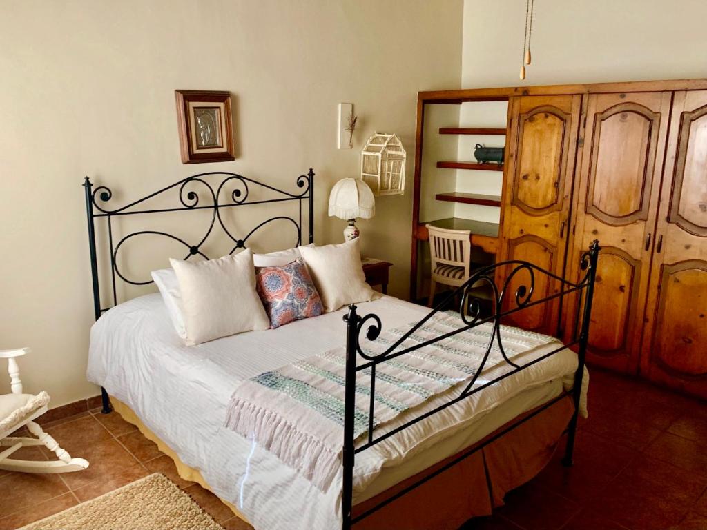 Postel nebo postele na pokoji v ubytování Rancho el Parral