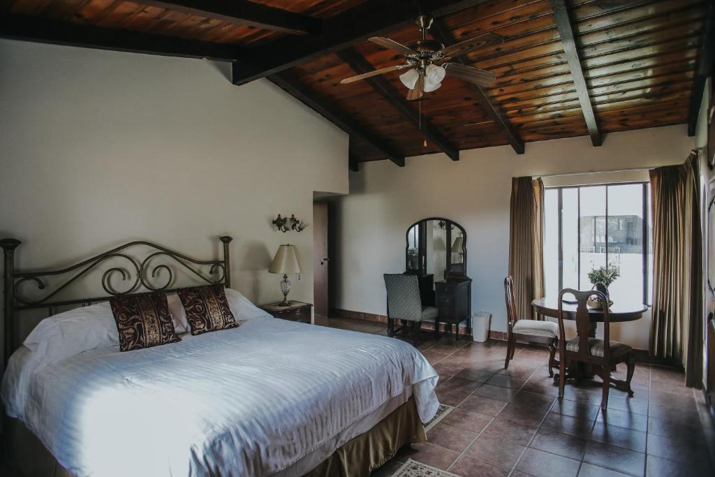 Postel nebo postele na pokoji v ubytování Rancho el Parral