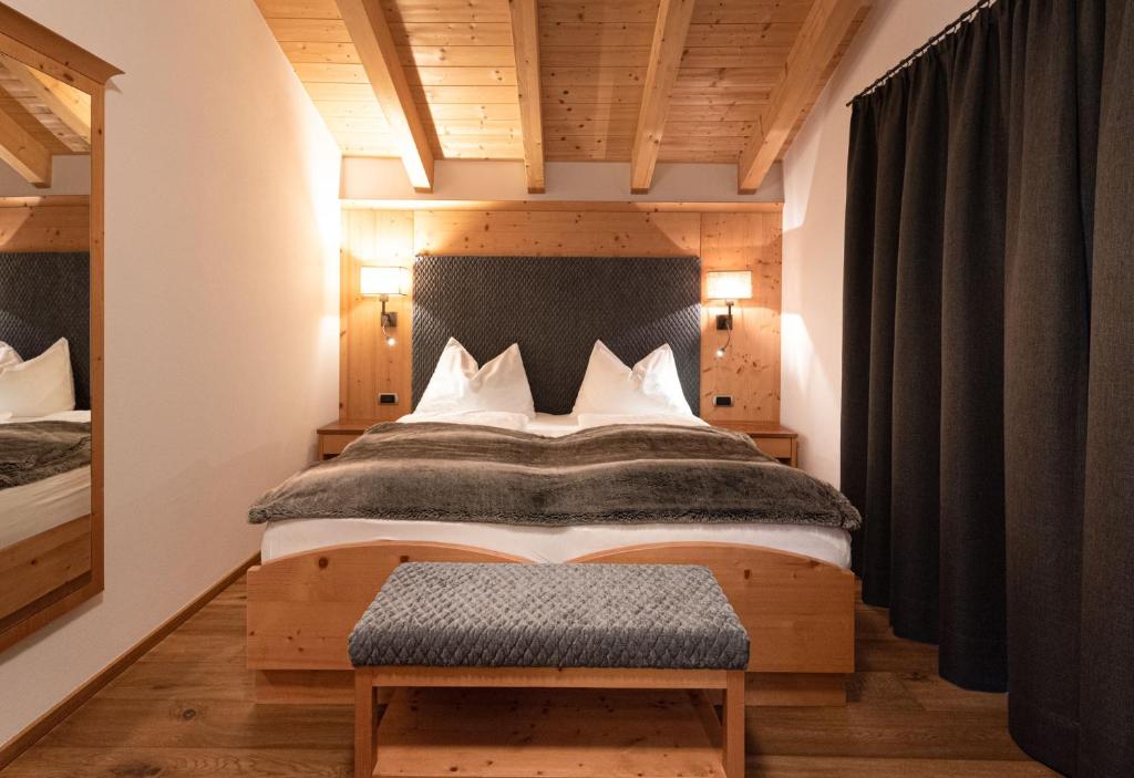 Łóżko lub łóżka w pokoju w obiekcie Residence Sovara