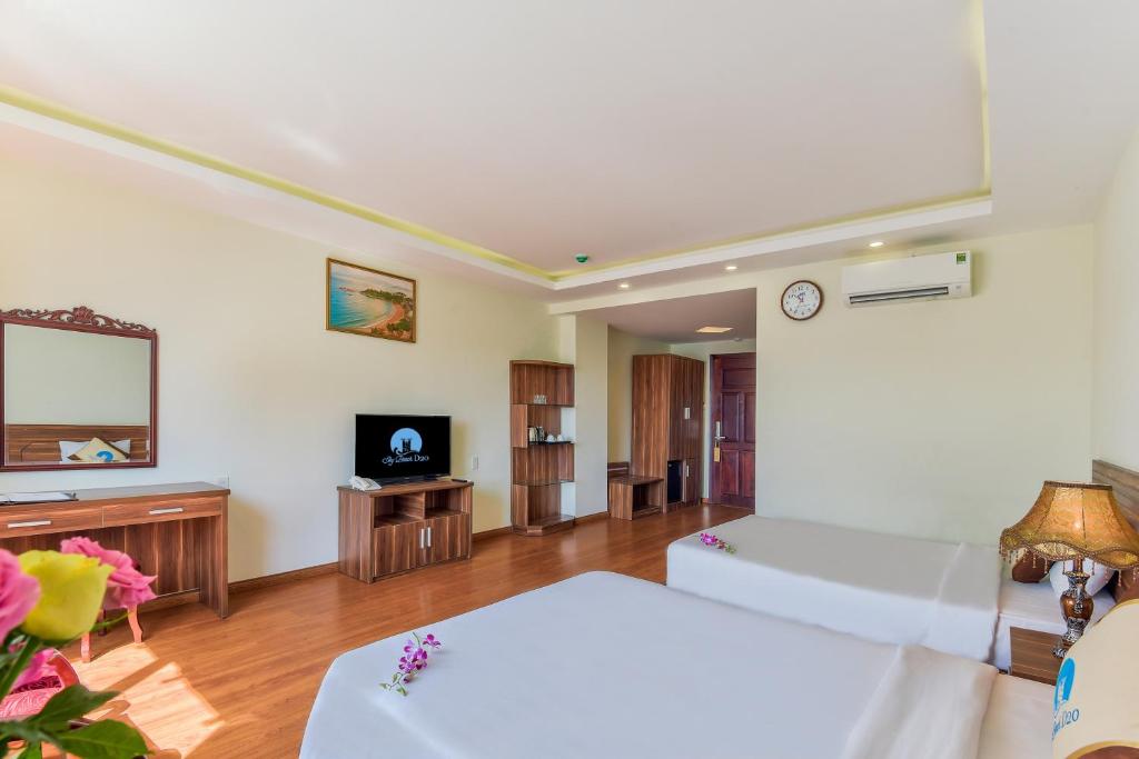 Giường trong phòng chung tại Sky Beach D20 Nha Trang