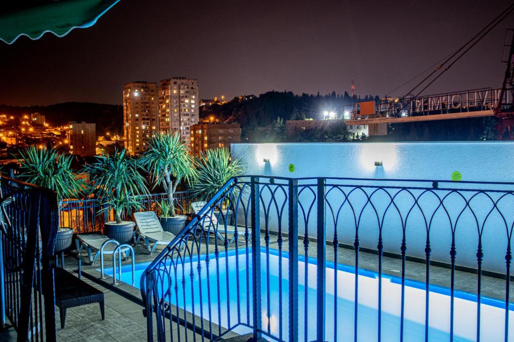 Bazén v ubytování TM Apart Hotel nebo v jeho okolí