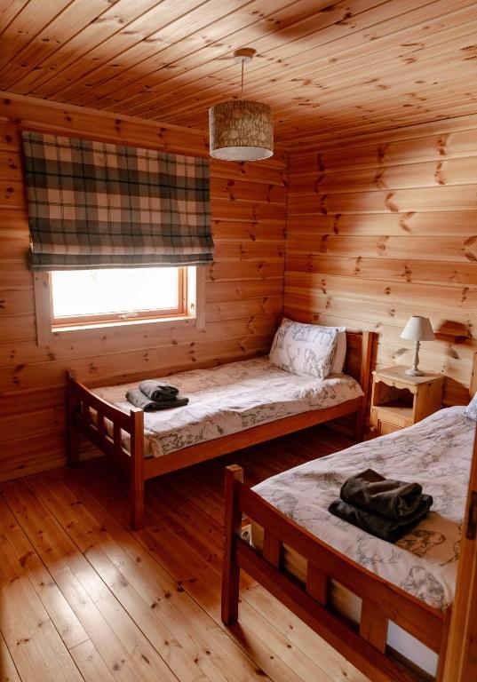 Postel nebo postele na pokoji v ubytování Pentland Lodge