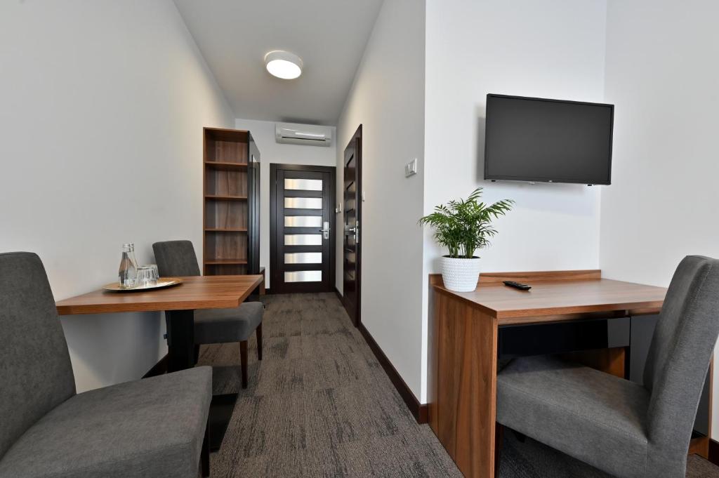 TV a/nebo společenská místnost v ubytování Hotel Terminal