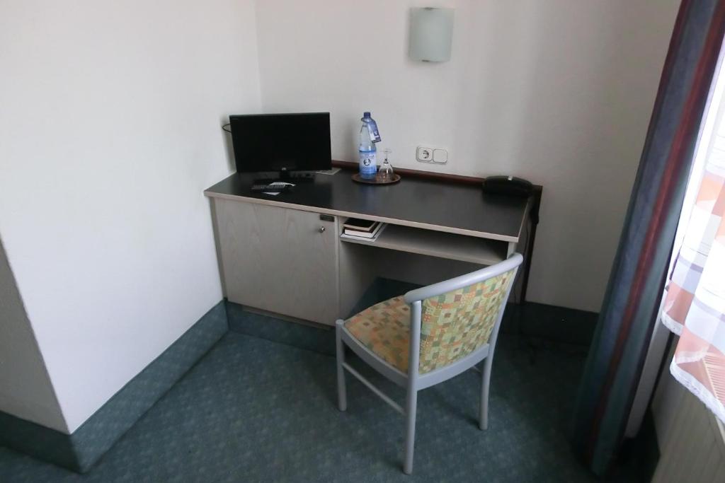TV a/nebo společenská místnost v ubytování Hotel Eigen
