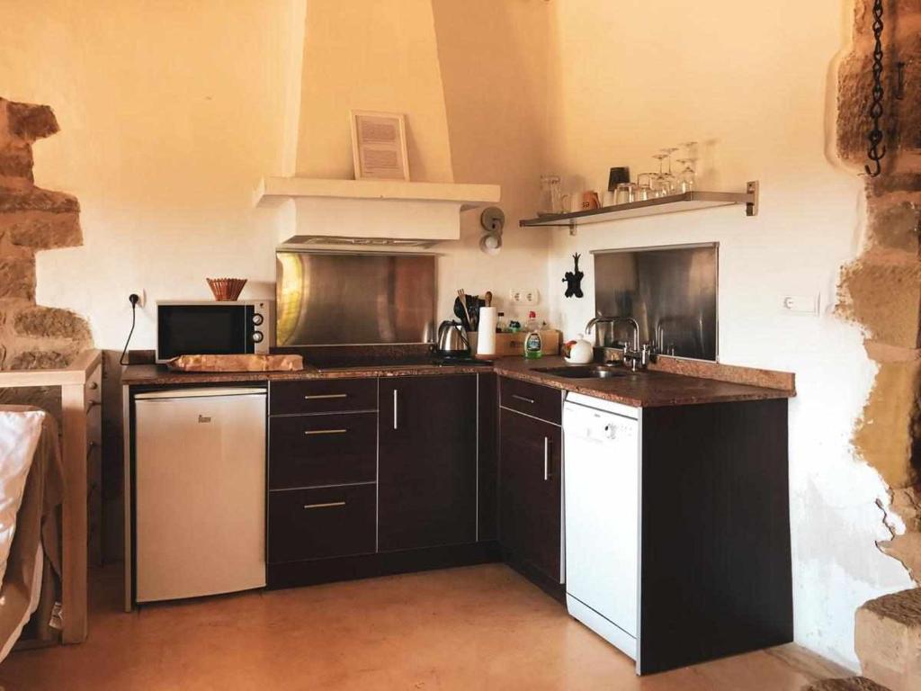 Kuchyň nebo kuchyňský kout v ubytování La Casa Laste