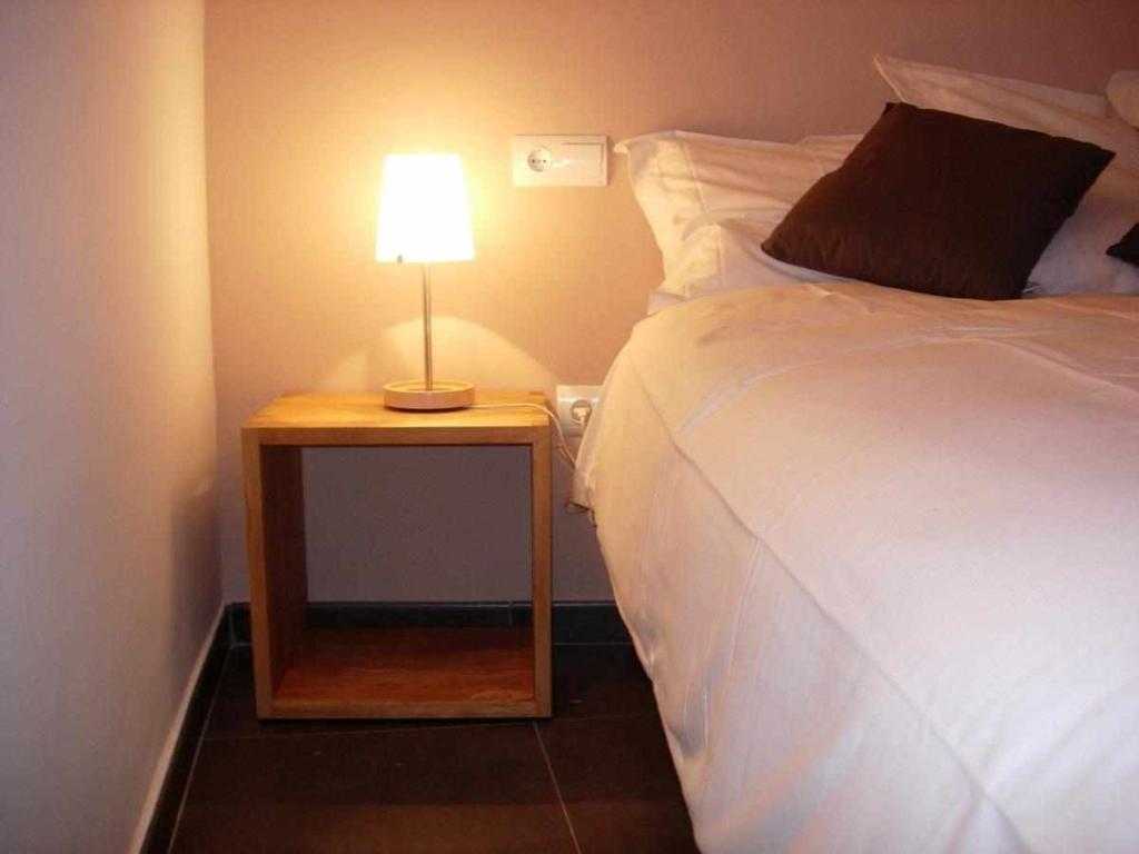 Postel nebo postele na pokoji v ubytování La Casa Laste