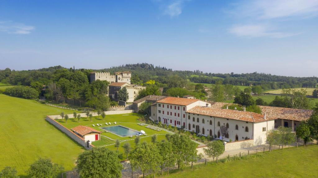 an aerial view of a house in a field at Borgo di Drugolo in Lonato del Garda