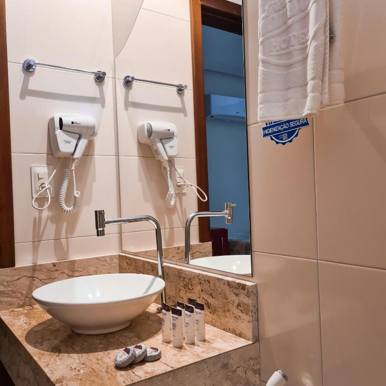 Um banheiro em Terra dos Diamantes Hotel