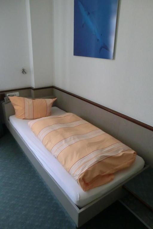Postel nebo postele na pokoji v ubytování Hotel Eigen
