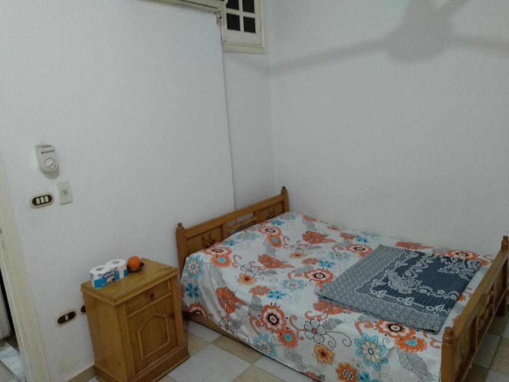 Postel nebo postele na pokoji v ubytování Bob Marley Homestay