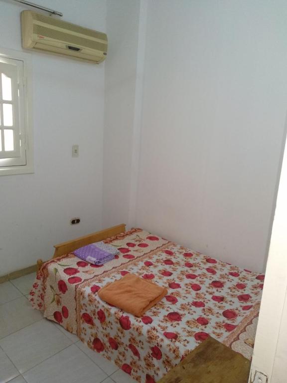 Postel nebo postele na pokoji v ubytování Bob Marley Homestay