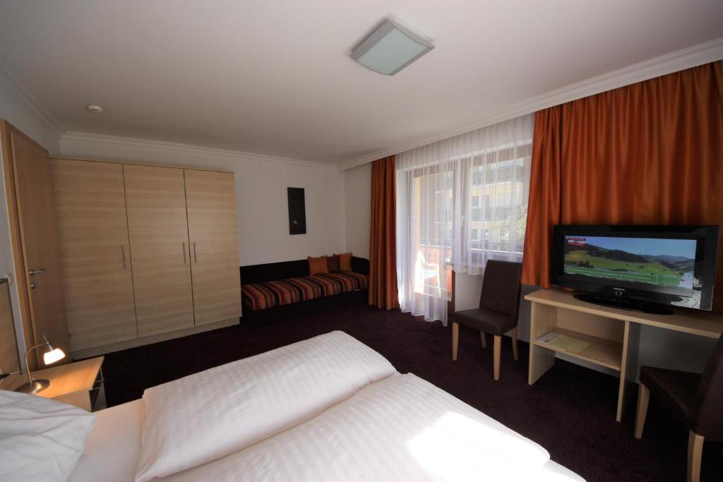 Postel nebo postele na pokoji v ubytování Hotel Sommerer - inklusive Joker Card im Sommer